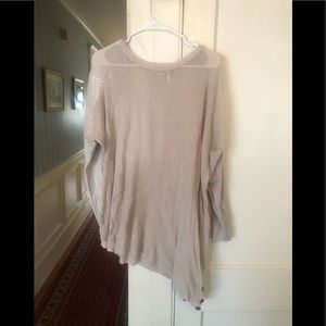 Asymmetrical light sweater